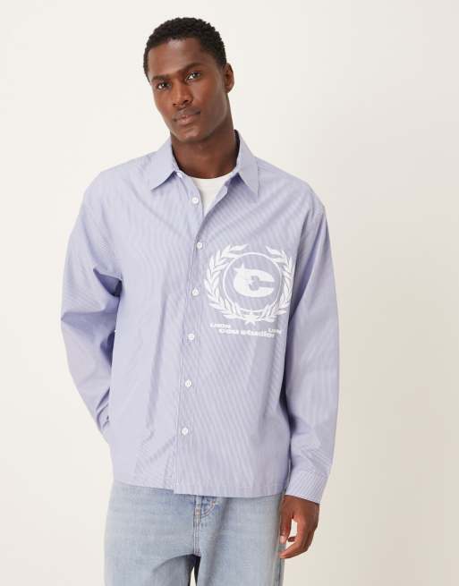 ASOS DESIGN - Camicia oversize a righe color blu e bianco con stampa sul petto