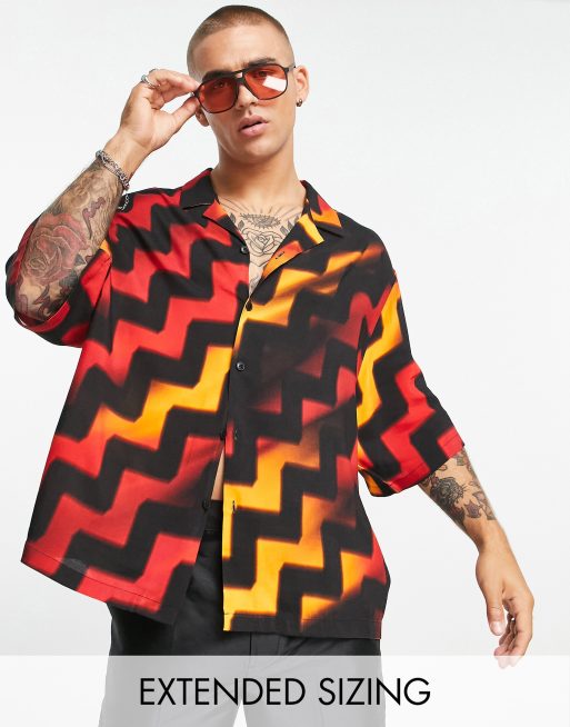 ASOS DESIGN - Camicia oversize con spalle scese, rever, con stampa a righe diagonali a zig-zag
