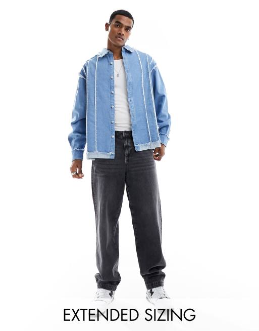 ASOS DESIGN - Camicia oversize in denim lavaggio blu con pannelli e bordi grezzi