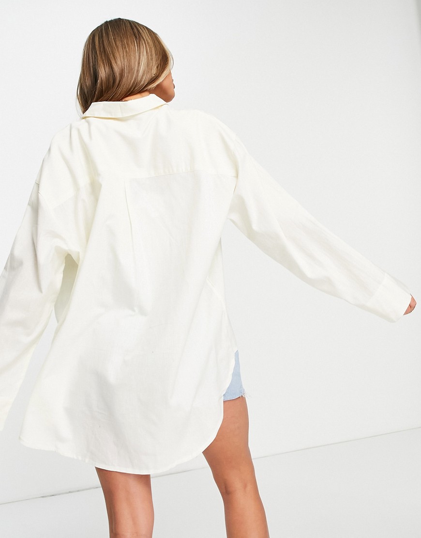 Camicia oversize in lino color avorio con taglio asimmetrico-Bianco - ASOS DESIGN Camicia donna  - immagine1