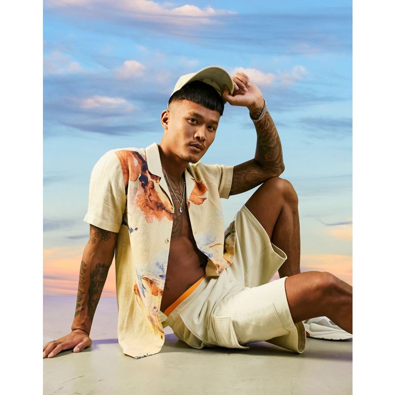 Camicie a maniche corte Uomo DESIGN - Camicia regular fit in tessuto beige testurizzato a fiori con colletto rever