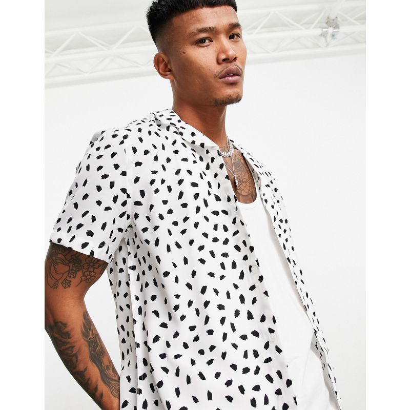 Uomo Camicie stampate DESIGN - Camicia vestibilità classica con rever e stampa a pois in bianco e nero in coordinato