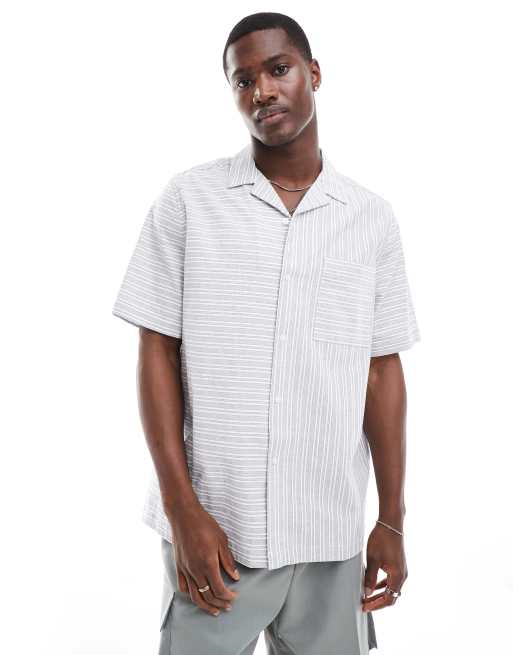 ASOS DESIGN - Camicia vestibilità comoda a righe blu con rever 