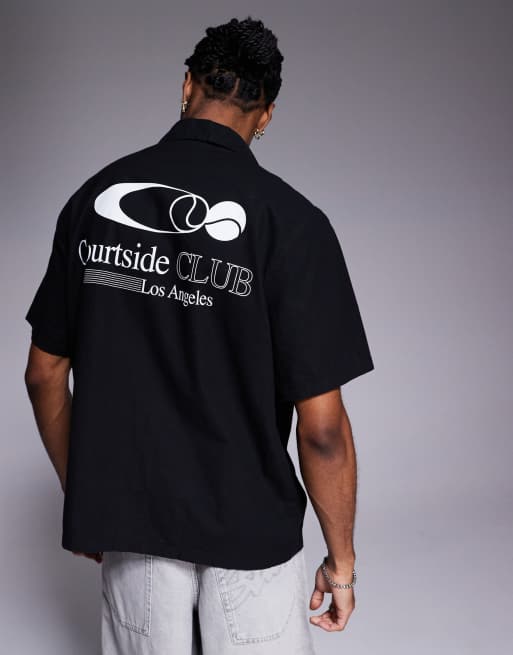 ASOS DESIGN - Camicia vestibilità comoda nera con rever e stampa tennis
