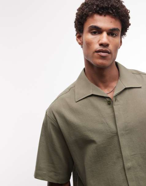 ASOS DESIGN - Camisa caqui extragrande con cuello de solapas y tapeta oculta - view 1