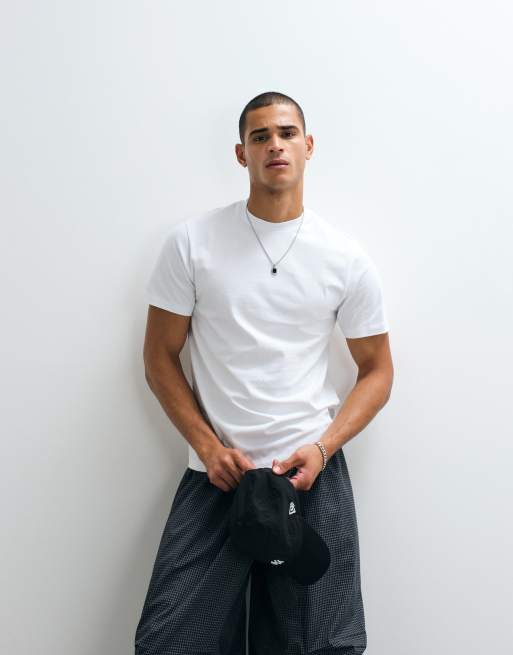 ASOS DESIGN - Camiseta blanca de corte estándar con estampado gráfico de estrellas, 3 de 5