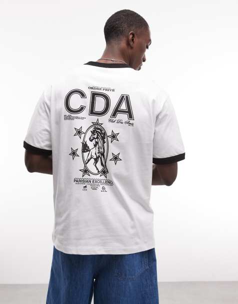 ASOS DESIGN - Camiseta blanca holgada con ribetes y estampado gráfico de vaquero - view 1