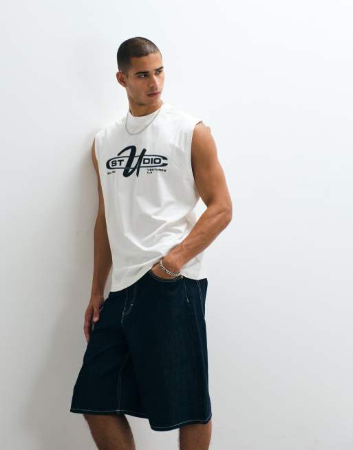 ASOS DESIGN - Camiseta color crema extragrande sin mangas con estampado gráfico "Studio Ventures", 4 de 5