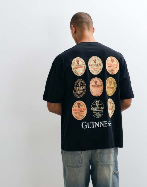 ASOS DESIGN camiseta extragrande con estampado multicolor de Guinness en la espalda en negro, 3 de 10