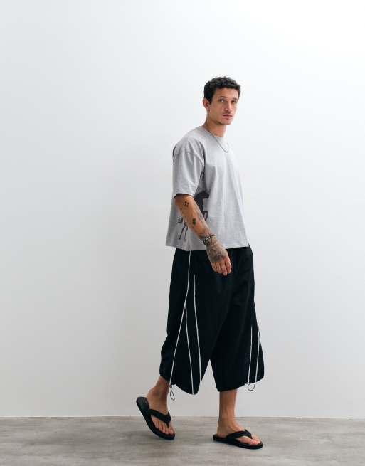 ASOS DESIGN - Camiseta gris de corte cuadrado extragrande con estampado gráfico de vaquero, 2 de 5