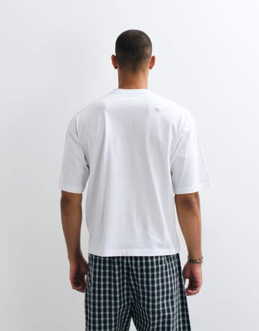 ASOS DESIGN - camiseta henley extragrande y de corte boxy con gráfico en el pecho en blanco, 5 de 5