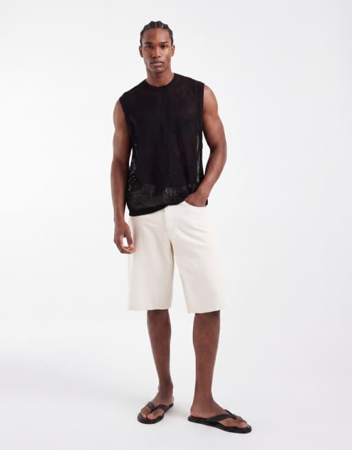 ASOS DESIGN - Camiseta negra holgada sin mangas con estampado floral de punto, 2 de 5