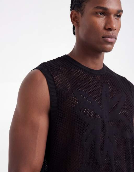 ASOS DESIGN - Camiseta negra holgada sin mangas con estampado floral de punto, 4 de 5