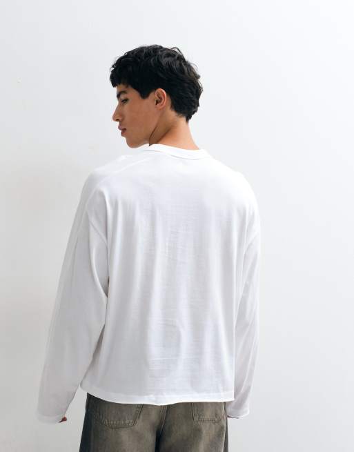 ASOS DESIGN - camiseta oversize de corte boxy y manga larga con paneles en las mangas y gráfico de texto en blanco, 4 de 5