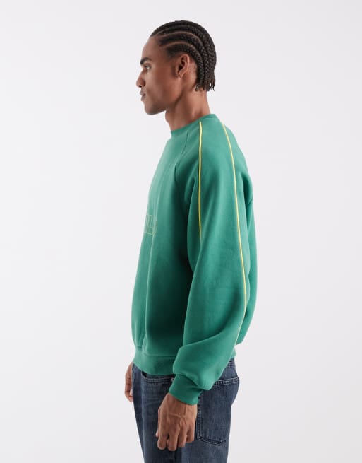 ASOS DESIGN - Camiseta verde extragrande con estampado de Brasil, cuello redondo y ribetes, 4 de 5