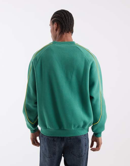 ASOS DESIGN - Camiseta verde extragrande con estampado de Brasil, cuello redondo y ribetes, 5 de 5
