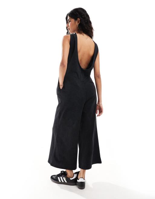 ASOS DESIGN Camisole Jumpsuit aus gewaschenem Jersey in Schwarz mit Taschendetail