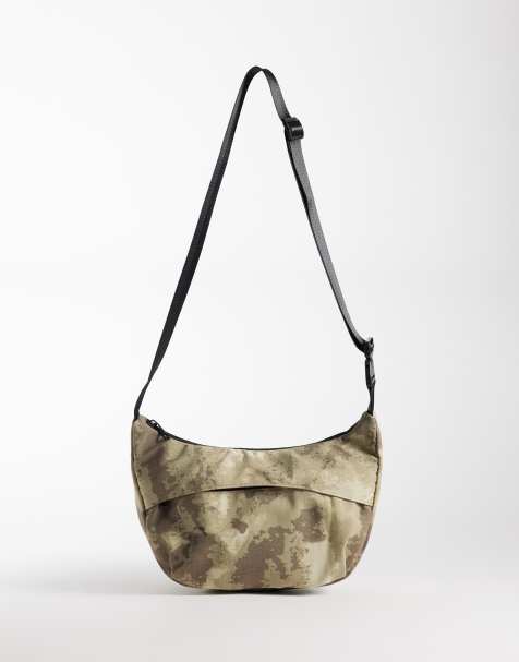 ASOS DESIGN camo print nylon crossbody bag in khaki - view 1