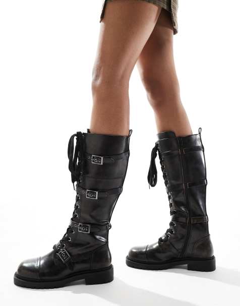 ASOS DESIGN Canada flat chunky buckle knee boots in black - view 1