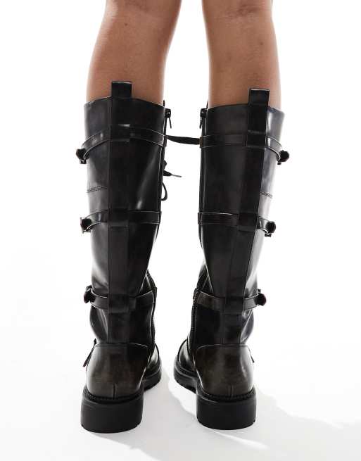 ASOS DESIGN Canada flat chunky buckle knee boots in black ASOS