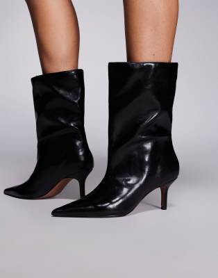 ASOS DESIGN - Candi - Weite Stiefel zum Hineinschlüpfen in Schwarz