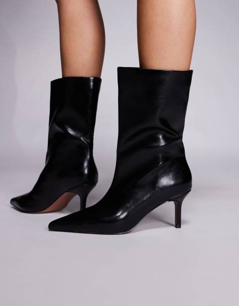 ASOS DESIGN Candi wide leg pull-on boots in black - view 1
