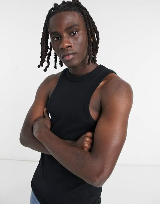 ASOS DESIGN - Canotta a coste attillata con scollo a vogatore, colore nero