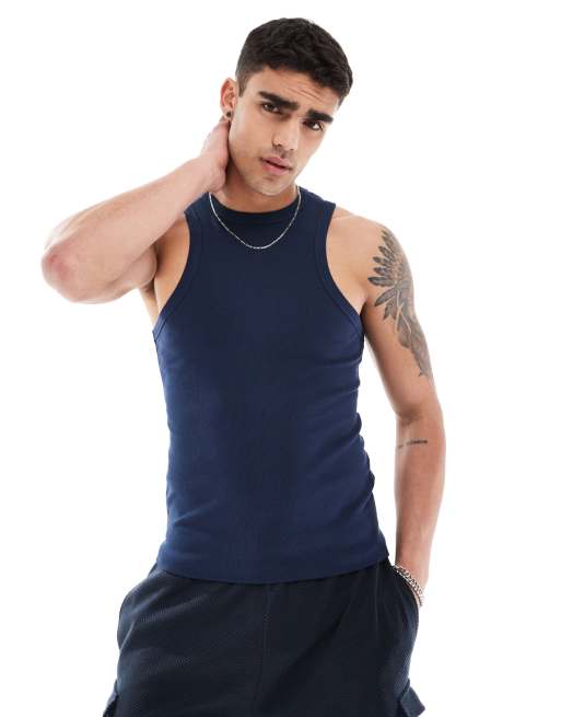 ASOS DESIGN - Canotta attillata blu navy a coste con scollo a vogatore