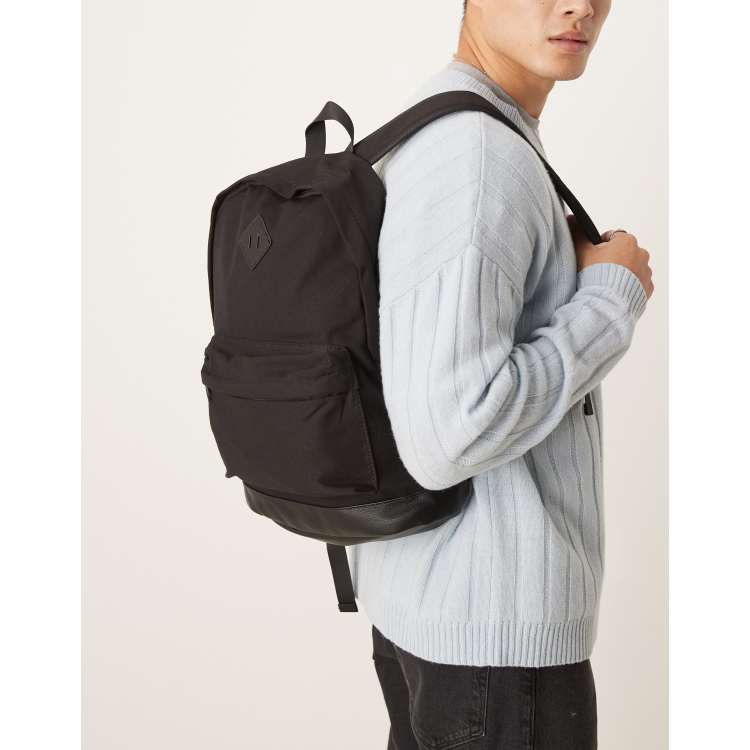 ASOS DESIGN canvas backpack with faux leather base in black