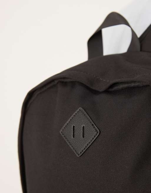 Vans realm black canvas backpack hot sale