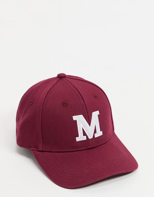 ASOS DESIGN canvas baseball cap with M initial in burgundy