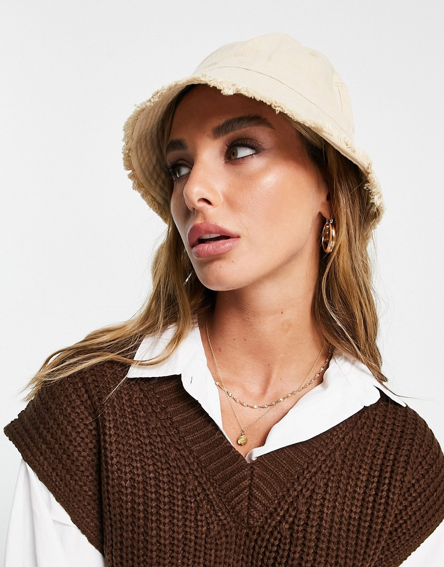 ASOS DESIGN canvas bucket hat with raw edge in light camel-Neutral
