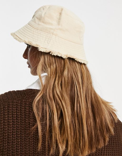ASOS DESIGN canvas bucket hat with raw edge in light camel