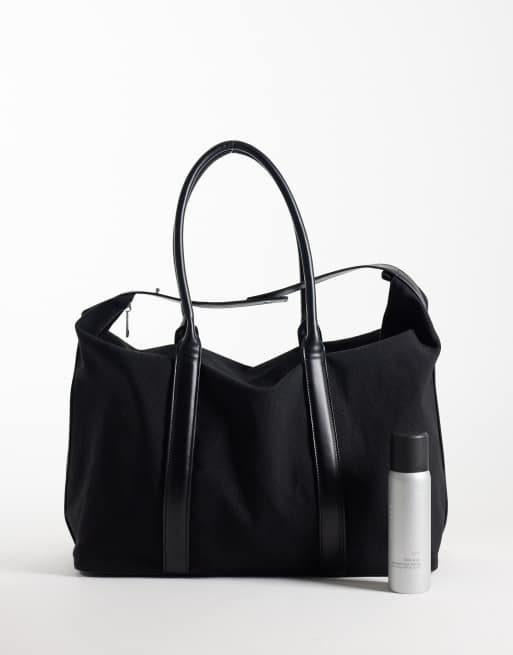 ASOS DESIGN canvas fabric carryall bag with faux leather straps in black, 2 of 4
