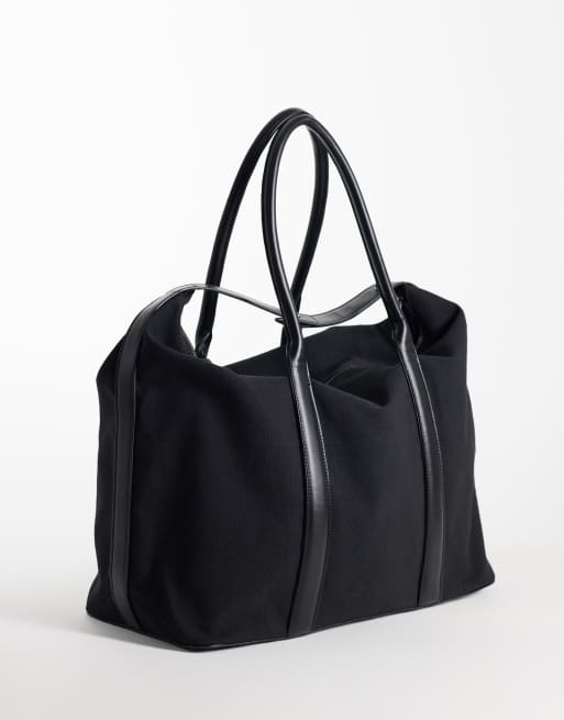 ASOS DESIGN canvas fabric carryall bag with faux leather straps in black, 4 of 4