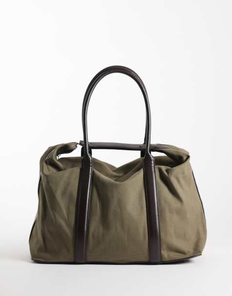 ASOS DESIGN canvas fabric holdall bag with constrast brown straps in khaki - view 1
