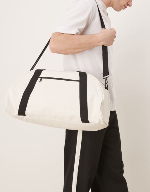 ASOS DESIGN canvas holdall bag in black and ecru