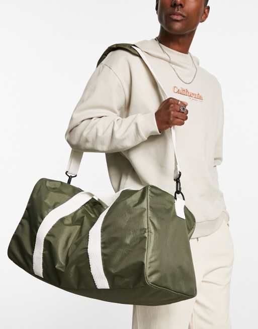 ASOS DESIGN canvas holdall bag with contrast strap in olive