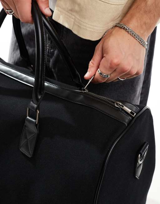 ASOS DESIGN canvas holdall in black