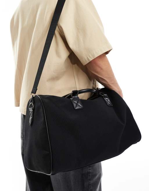 ASOS DESIGN canvas holdall in black