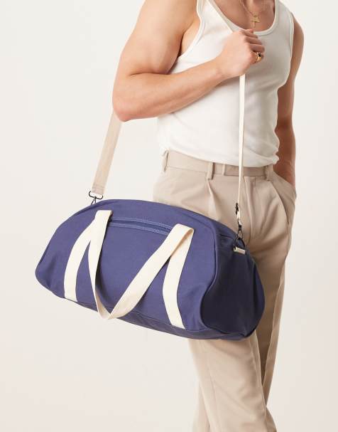 ASOS DESIGN canvas holdall in navy - view 1