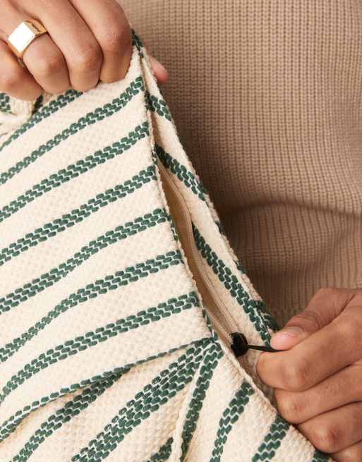 ASOS DESIGN canvas sling cross body bag in ecru with green stripe