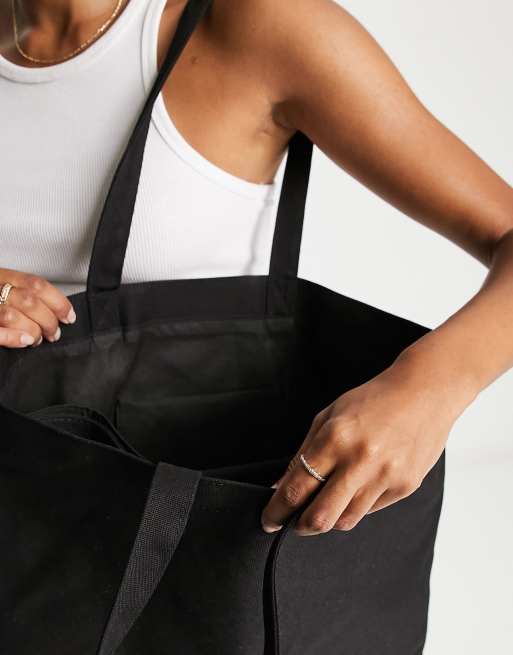 ASOS DESIGN tote bag with removeable laptop compartment in black