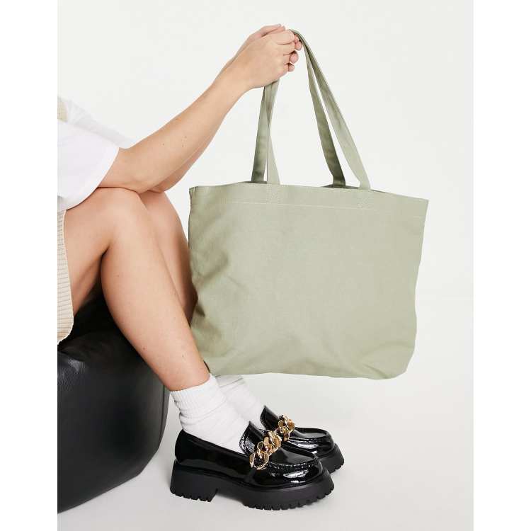 ASOS DESIGN canvas tote bag with laptop compartment in sage