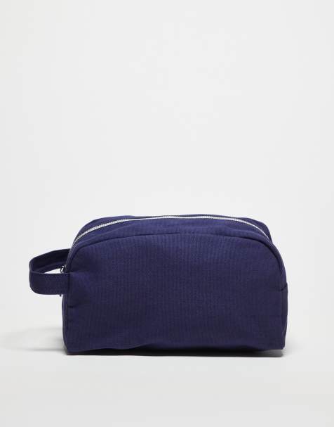 ASOS DESIGN canvas wash bag in navy - view 1