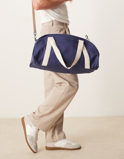 ASOS DESIGN canvas weekend duffel bag in navy and ecru, 2 of 4