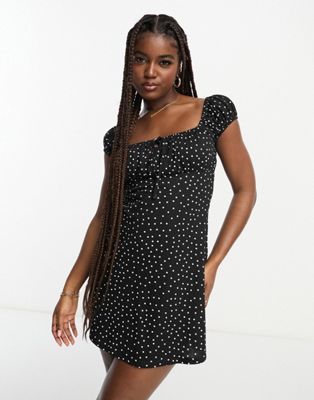 ASOS DESIGN cap sleeve ruched mini dress with tie detail in spot