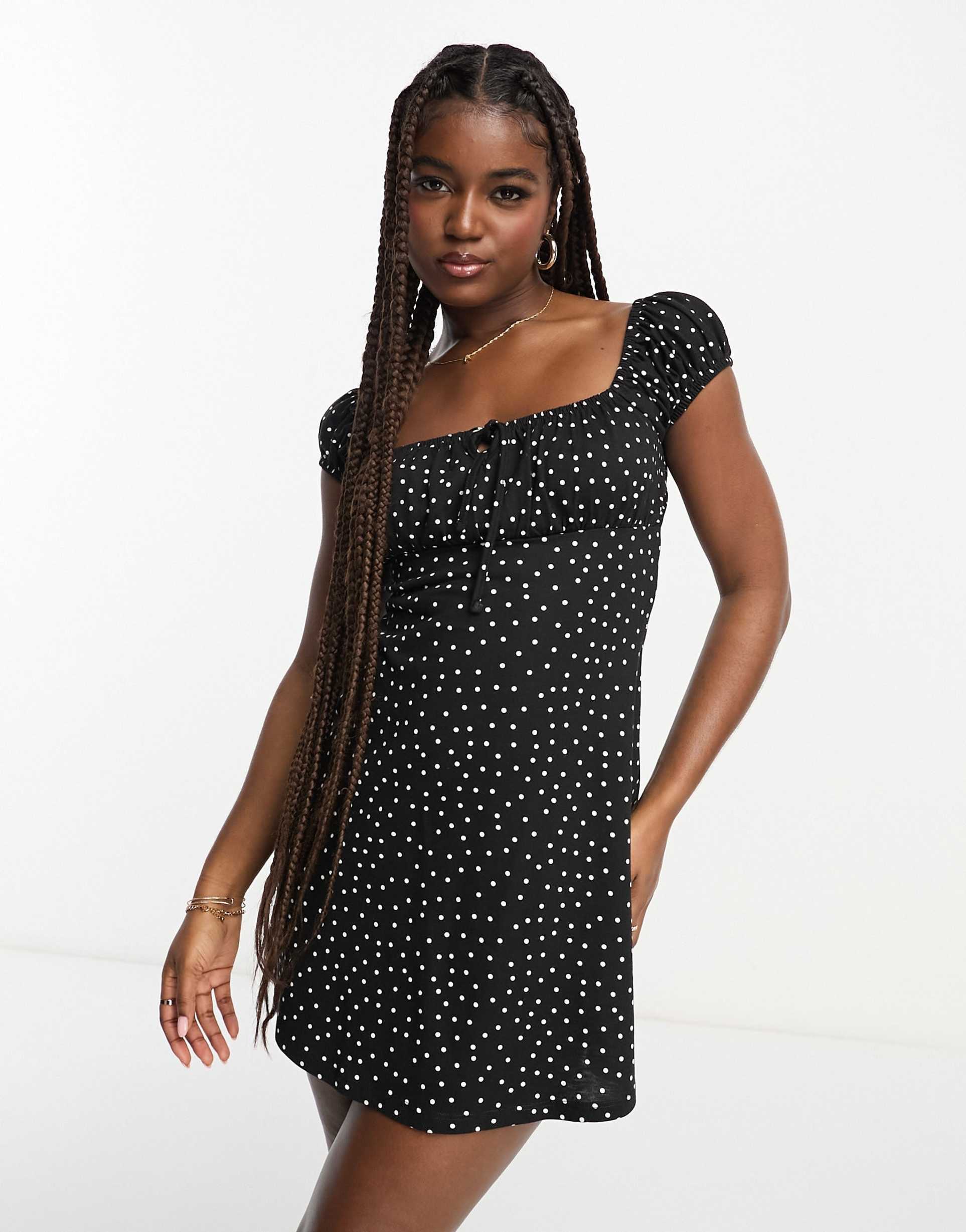 asos design cap sleeve ruched mini dress with tie detail in spot