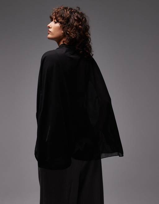 ASOS DESIGN – Cape aus transparentem Netzstoff in Schwarz mit hinten längerem Saum, 4 von 4