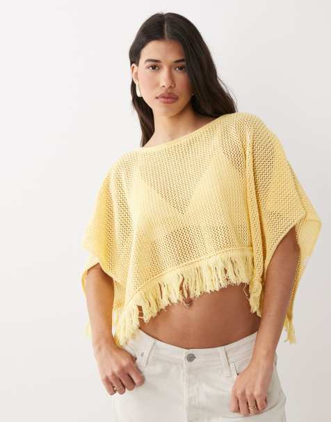 ASOS DESIGN – Cape aus weitmaschigem Strick in Buttermilchgelb mit Fransen - view 1
